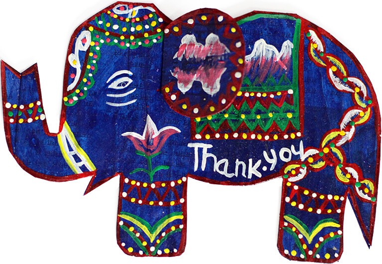 Raj's hand-made elephant card. "Thank you" is written under its ear.