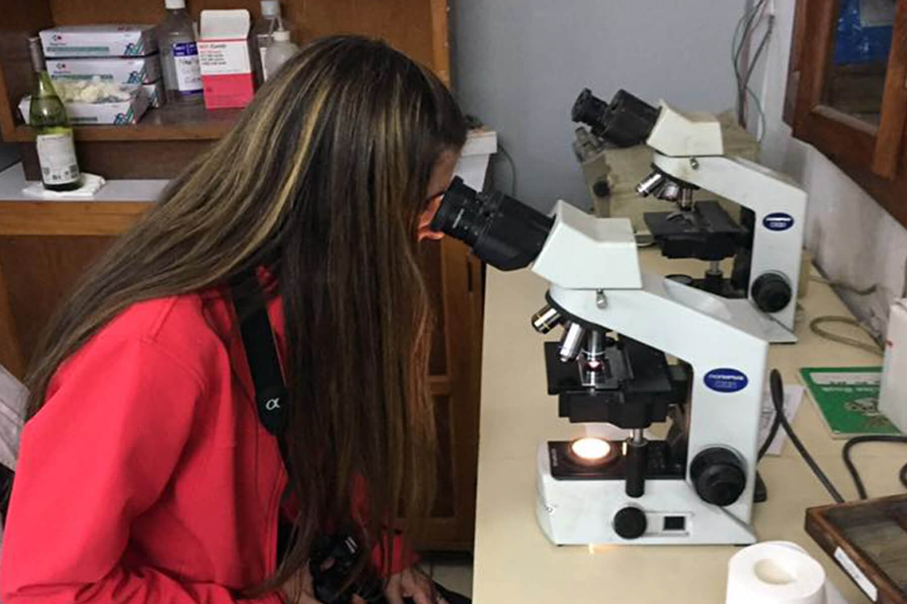 Lisa seeing leprosy bacteria at Anandaban Research Centre, a world-leading research facility for Reaction studies